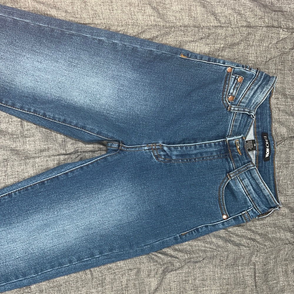 Single button slant pocket skinny Jean